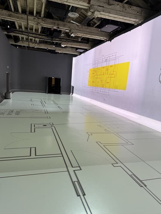 Design Theater showing floor and wall projections of architectural plans in action